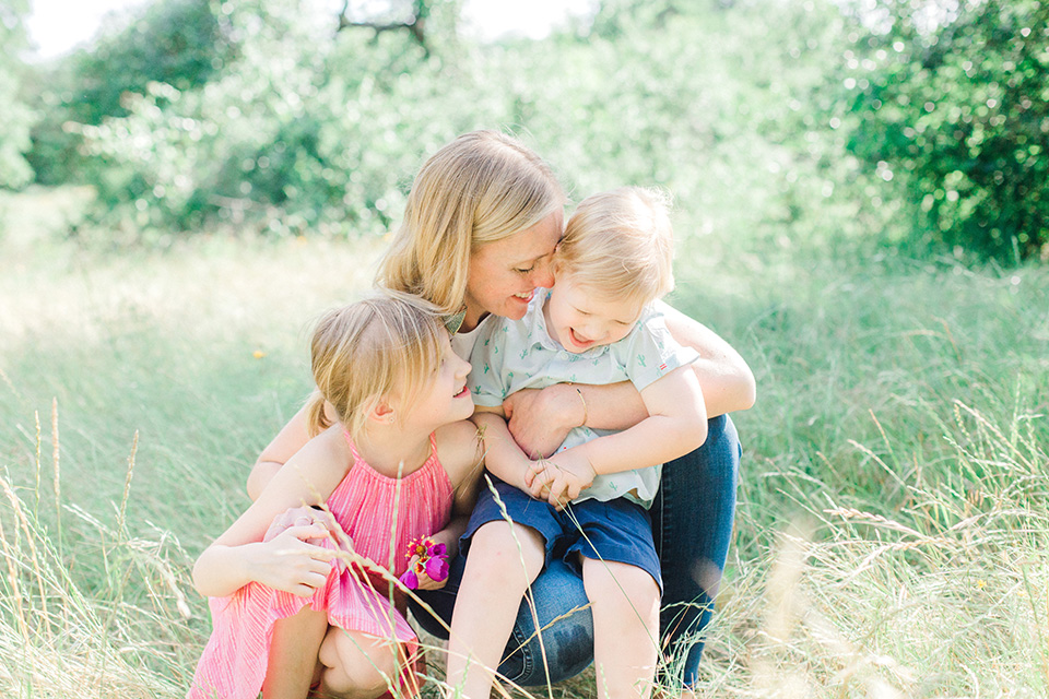 mother with two children natural light