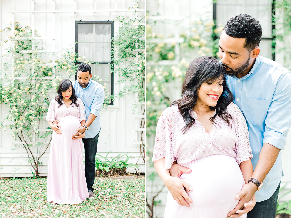 couple standing in garden for maternity session in texas 
