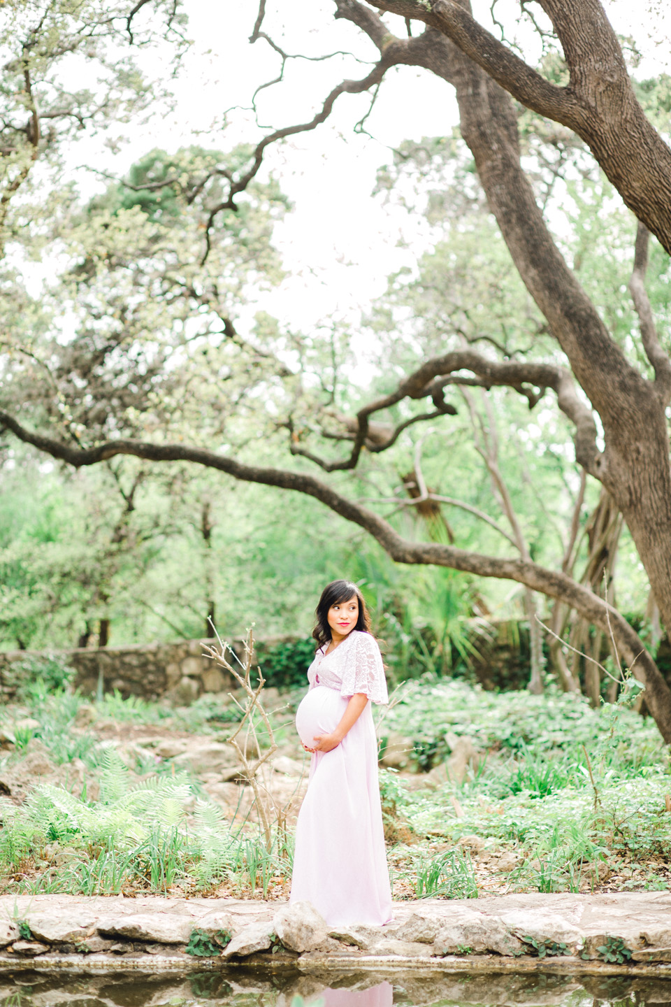 beautiful mother to be in trees area