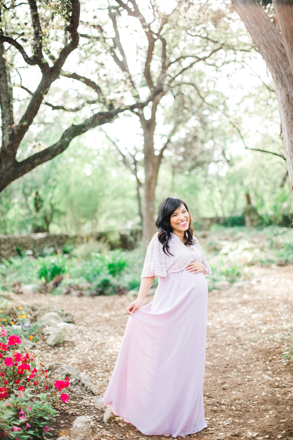 expecting mother in pink dress